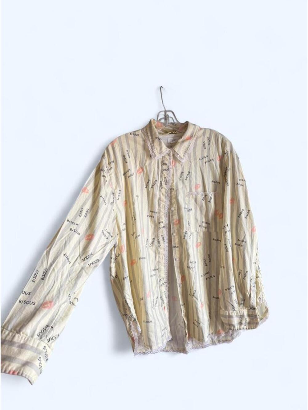 Aerie striped button-up blouse with lace trim and pockets. Size: M